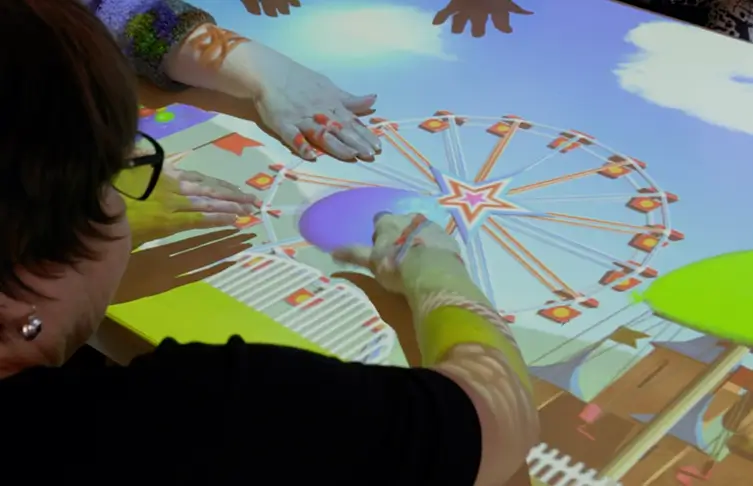 Seniors interacting with Obie projector